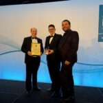 Colleagues from Tony Gee and Midland Metro Alliance receive their award on stage at the ICE Awards